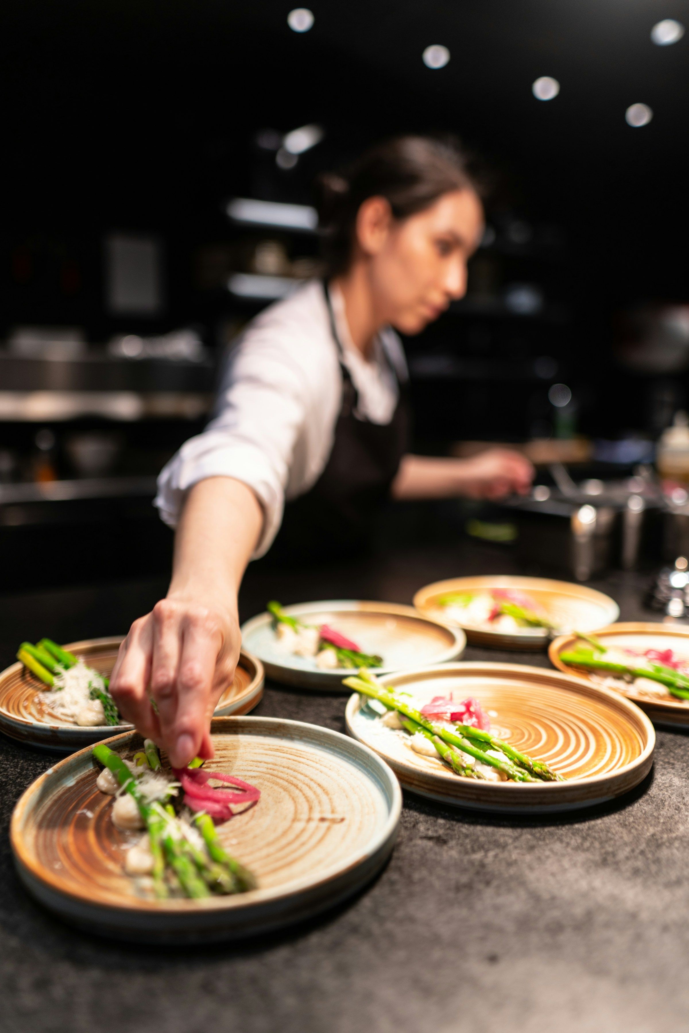 Chef Elena Voss in the North & Pine kitchen